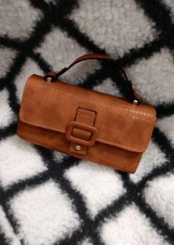 Womens buckle handbag